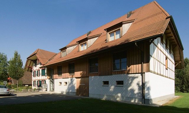 The Blumensteinhaus, a timber-framed building under a deep hipped roof