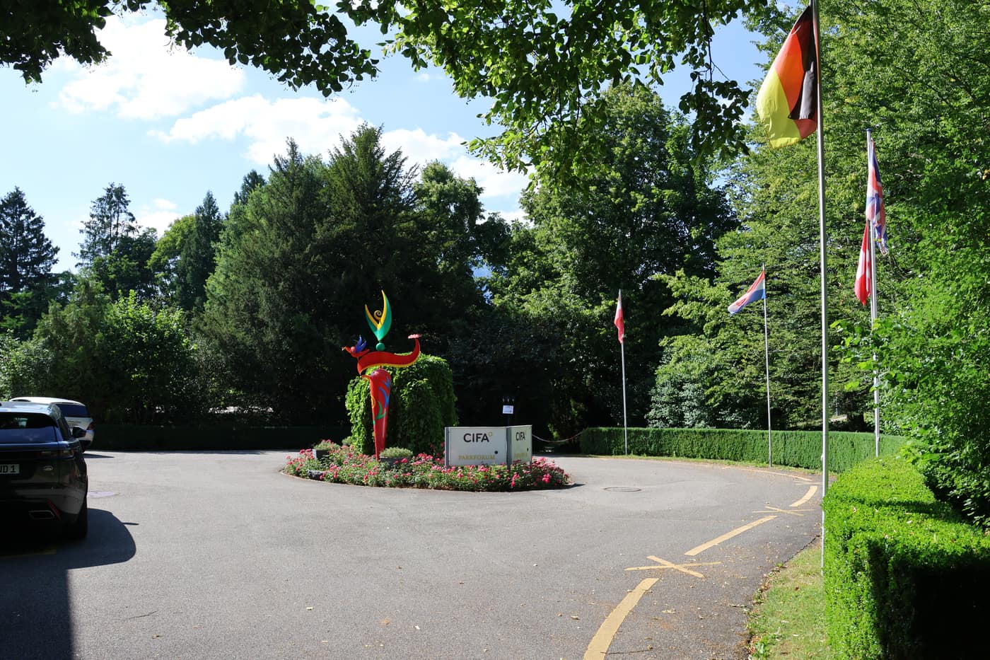 Flags at the entrance to the CIFA seat at Wylihof